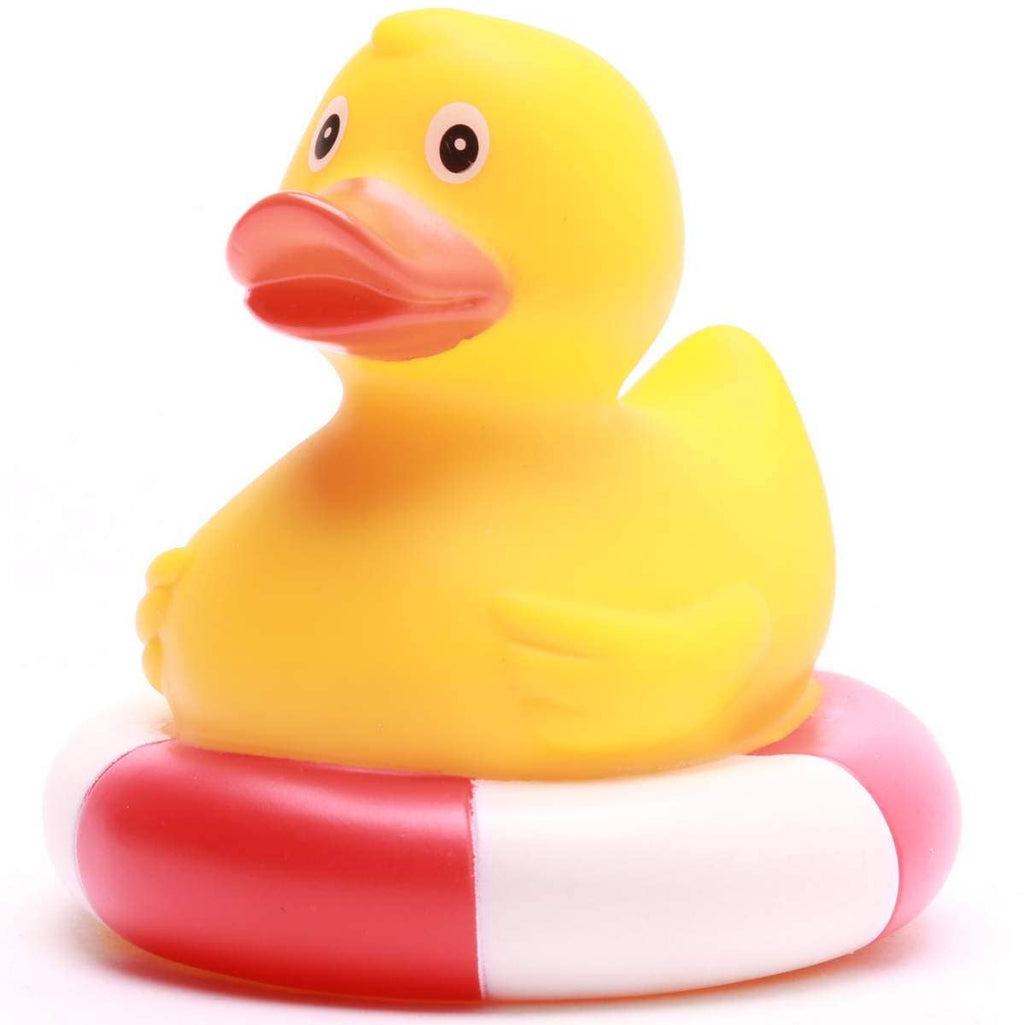 canard de bain dans une bouee de sauvetage rouge canard en caoutchouc