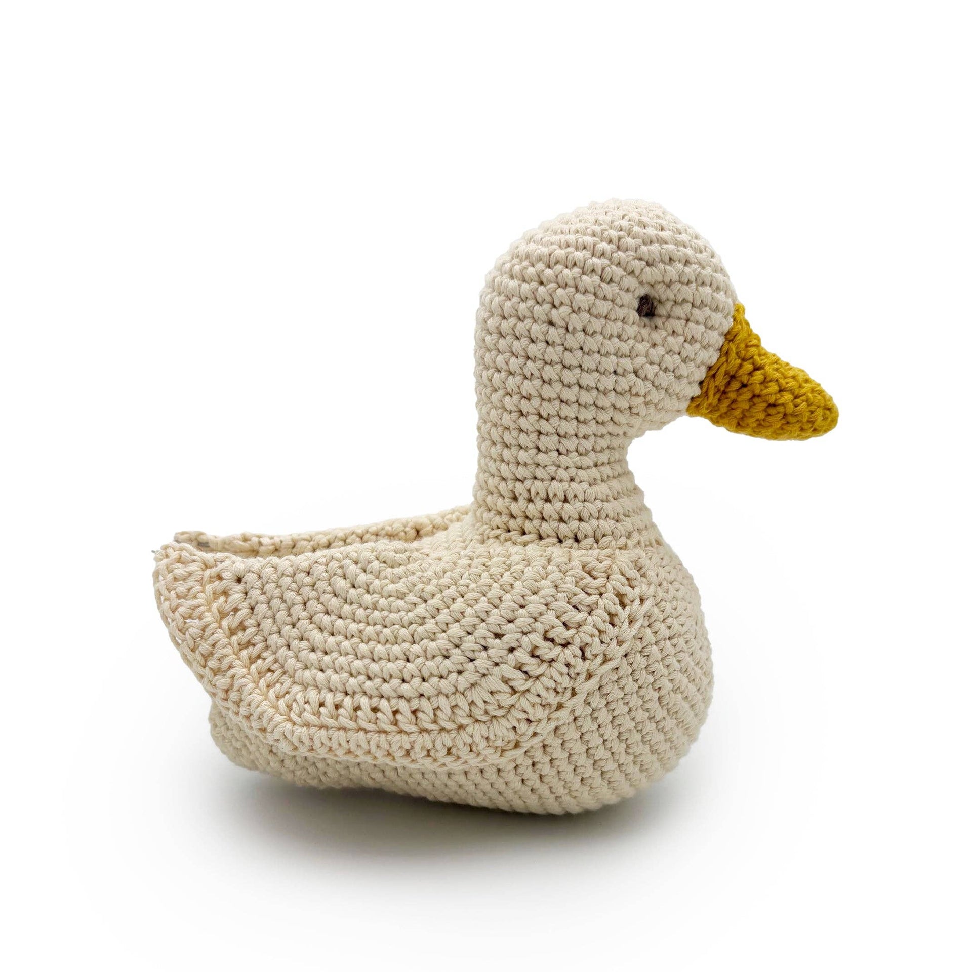 Knitted musical duck plush