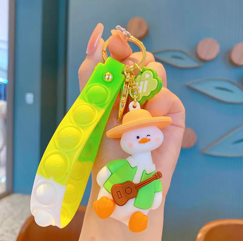 porte-cles-canard-guitare