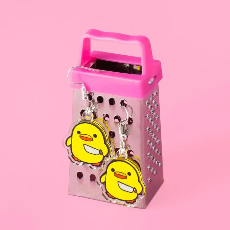 Duck earrings with a knife