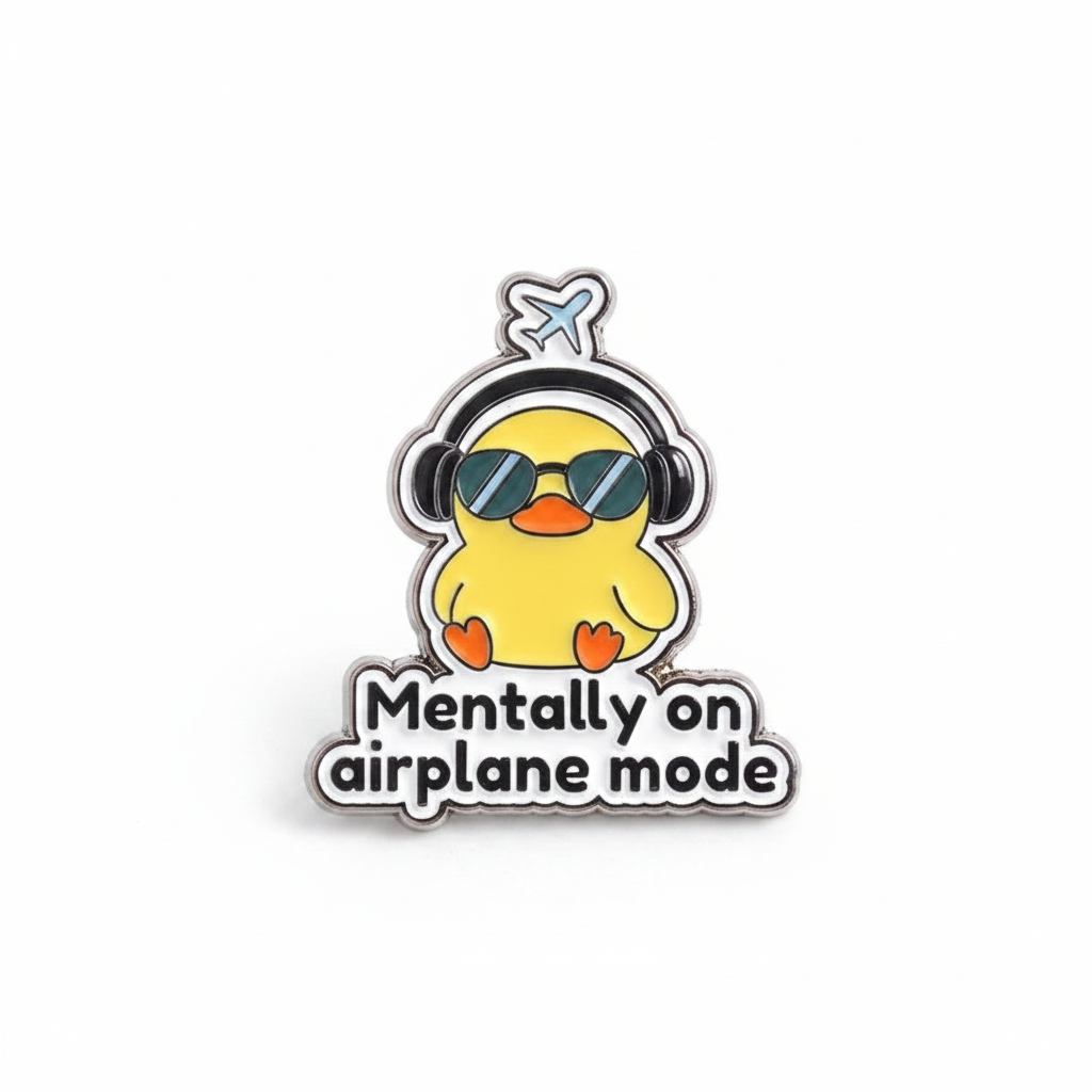 Photo produit - Pin’s Canard « Mentally on Airplane Mode »